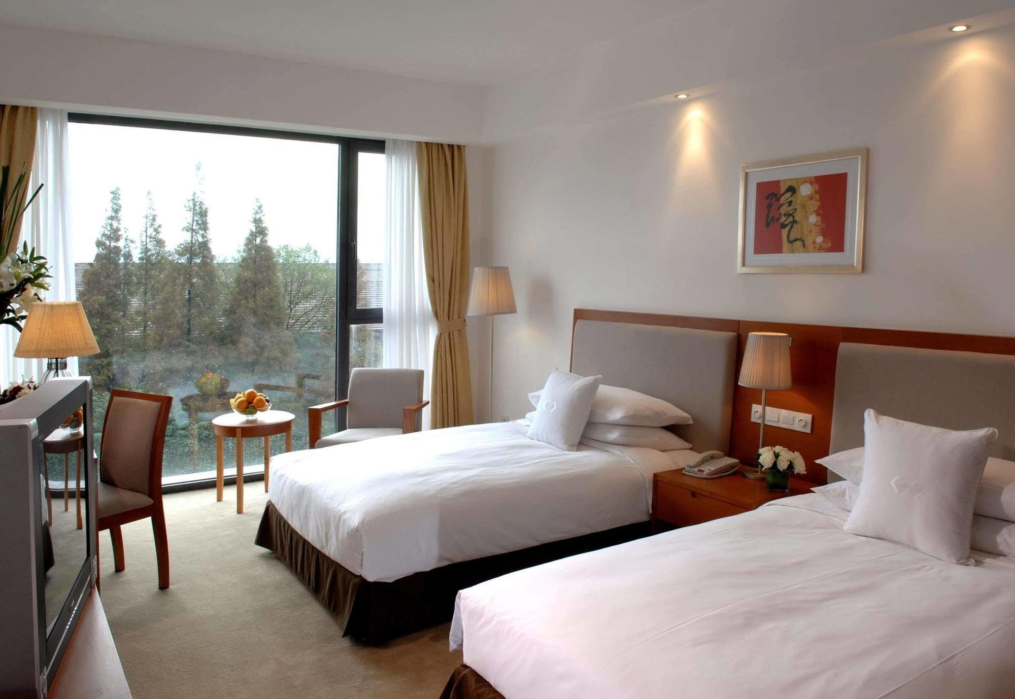 Gloria Plaza Hotel Kangqiao Shanghai Exteriör bild