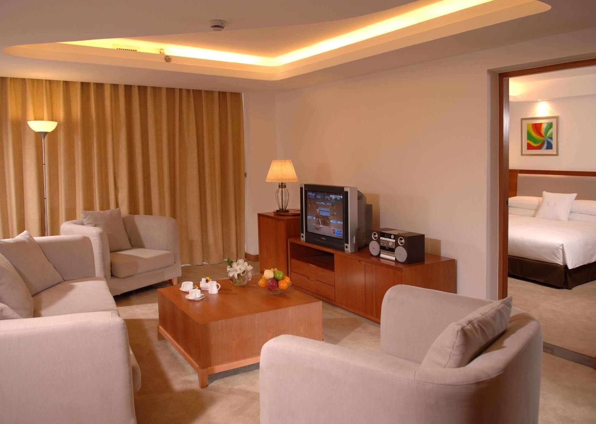 Gloria Plaza Hotel Kangqiao Shanghai Rum bild